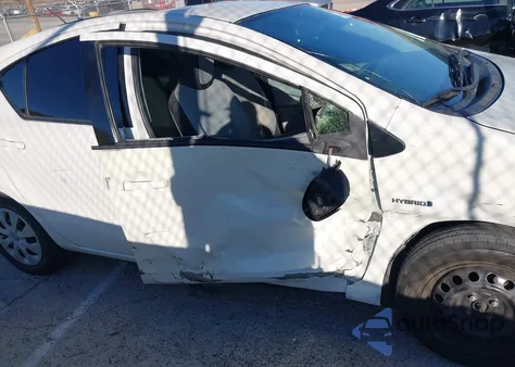 2014 Toyota Prius C One from USA, damaged, VIN JTDKDTB31E1558219